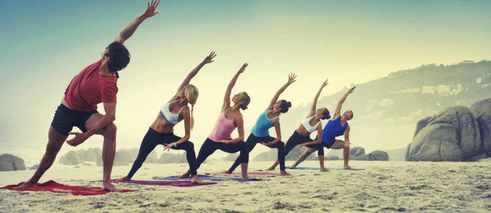 Yoga group on beach